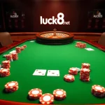 Trải nghiệm trò chơi đầy hồi hộp tại https://luck8.net với cảnh casino sống động có chip poker và bánh xe roulette.